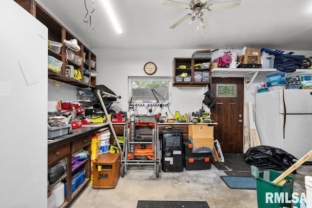 911 Cardinal Dr, Maquoketa, IA 52060 - storage featuring a ceiling fan