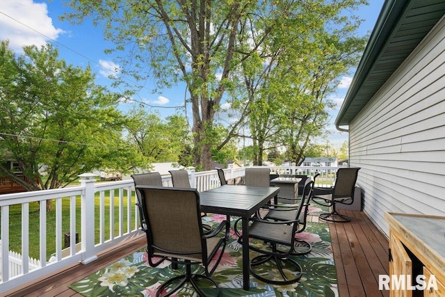 911 Cardinal Dr, Maquoketa, IA 52060 - wooden terrace with outdoor dining area
