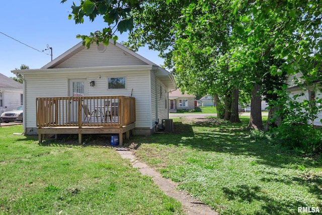404 S 23rd St, Herrin, IL 62948 - rear view of house featuring a deck, a lawn, and central air condition unit