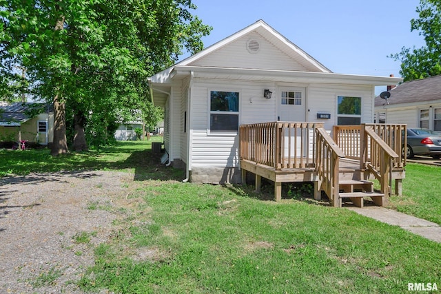 404 S 23rd St, Herrin, IL 62948 - view of front of house featuring a front yard and a deck