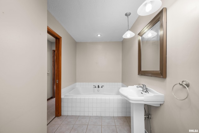2920 Roosevelt St, Clinton, IA 52732 - full bath with tile patterned flooring and a bath