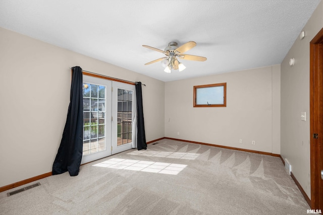 2920 Roosevelt St, Clinton, IA 52732 - empty room with light carpet, baseboards, and ceiling fan