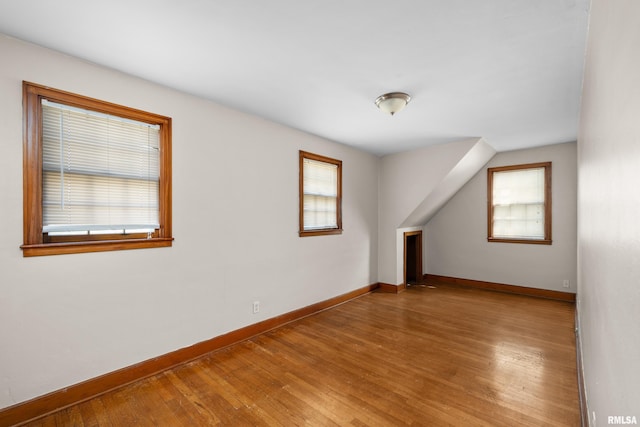 2920 Roosevelt St, Clinton, IA 52732 - bonus room with wood-type flooring, healthy amount of natural light, and baseboards