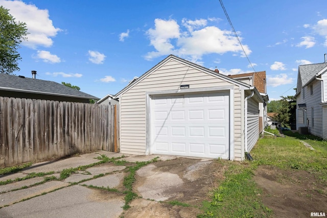 2920 Roosevelt St, Clinton, IA 52732 - detached garage featuring central AC unit and driveway