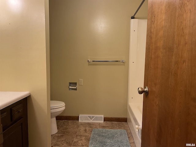 201 S Herrmann Dr, Ridgway, IL 62979 - full bath featuring vanity, toilet, baseboards, and tile patterned flooring