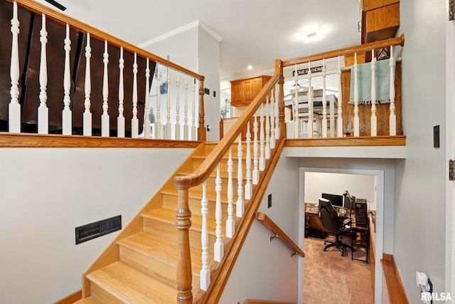 5760 Jenny Ln, Bettendorf, IA 52722 - stairway with carpet flooring, baseboards, ornamental molding, and recessed lighting
