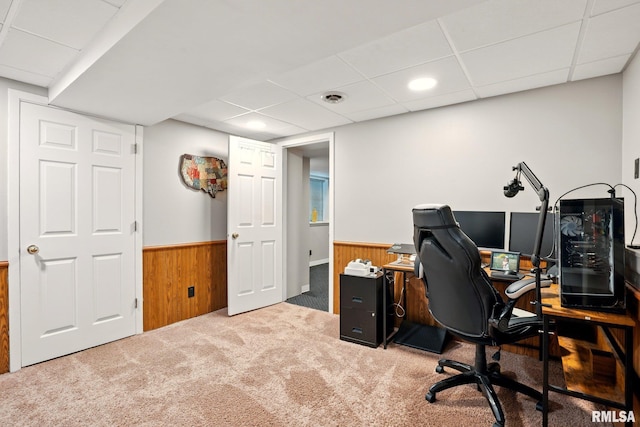 5760 Jenny Ln, Bettendorf, IA 52722 - carpeted office featuring wainscoting, a paneled ceiling, and wood walls