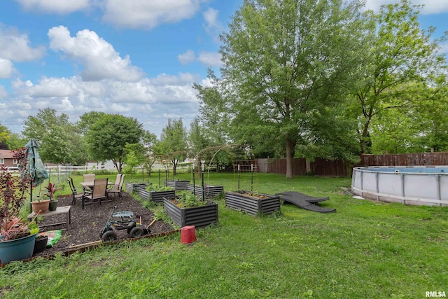 521 E Park St, Geneseo, IL 61254 - view of yard with a vegetable garden