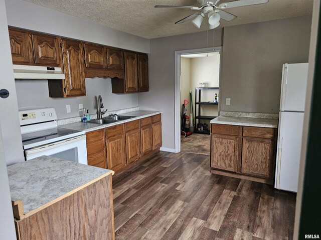1222 Midway Ct, Marion, IL 62959 - kitchen featuring white appliances, under cabinet range hood, a sink, ceiling fan, and dark wood-type flooring