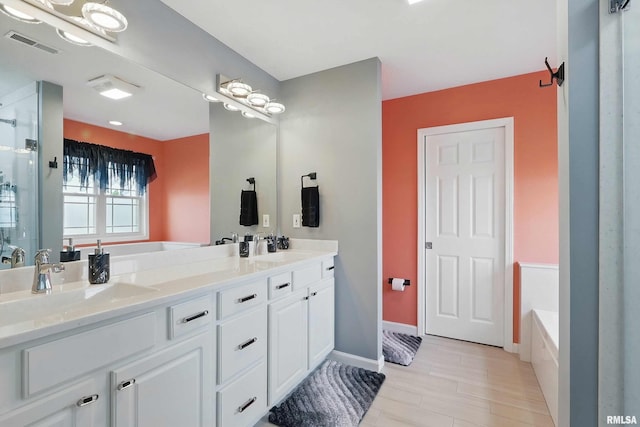 108 N Howard Ln, Long Grove, IA 52756 - full bathroom featuring a bath, double vanity, wood finished floors, a shower with shower door, and baseboards