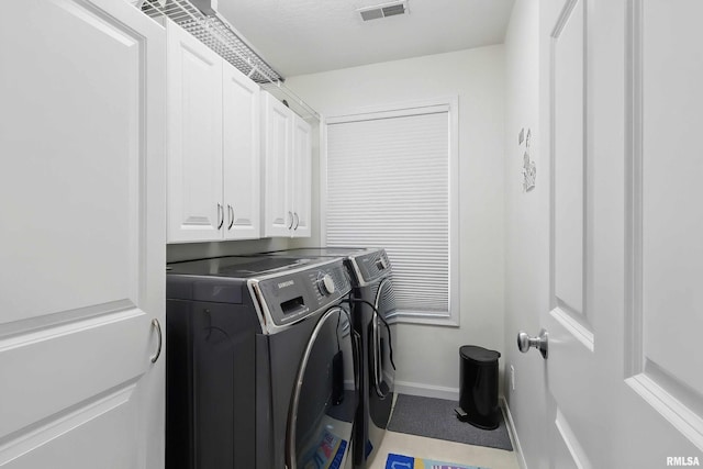 108 N Howard Ln, Long Grove, IA 52756 - laundry room featuring washer and dryer, baseboards, and cabinet space