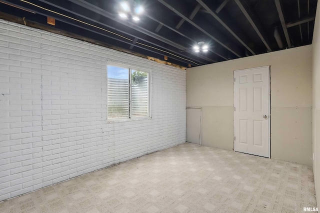 108 N Howard Ln, Long Grove, IA 52756 - basement featuring brick wall