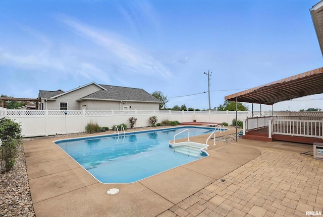 108 N Howard Ln, Long Grove, IA 52756 - view of pool with a fenced backyard, a patio, and a deck