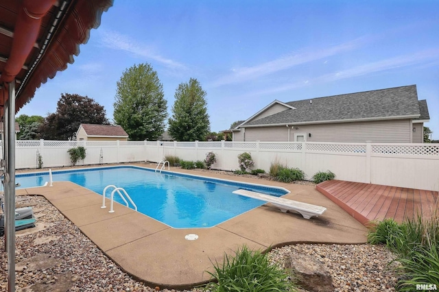 108 N Howard Ln, Long Grove, IA 52756 - view of pool featuring a fenced backyard, a deck, a diving board, and a patio area