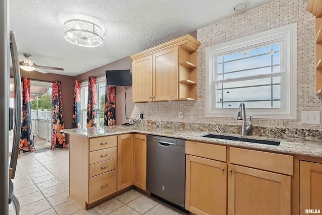 108 N Howard Ln, Long Grove, IA 52756 - kitchen featuring stainless steel dishwasher, light brown cabinetry, open shelves, a sink, and a textured ceiling