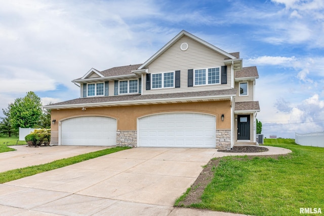 4260 Sapphire Ln, Bettendorf, IA 52722 - view of front facade with stone siding, cooling unit, concrete driveway, a front lawn, and a garage