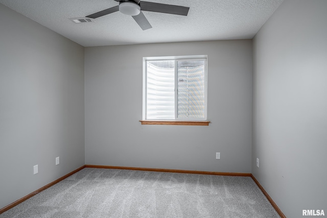 4260 Sapphire Ln, Bettendorf, IA 52722 - carpeted empty room featuring ceiling fan, a textured ceiling, and baseboards