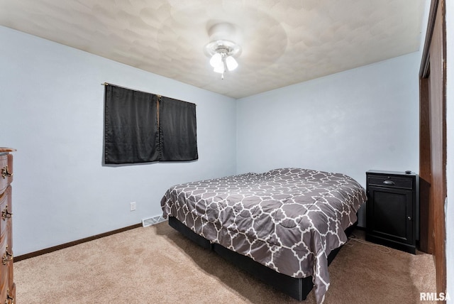 1409 10th Ave, Viola, IL 61486 - carpeted bedroom featuring baseboards