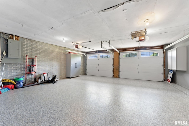 1409 10th Ave, Viola, IL 61486 - garage with electric panel and a garage door opener
