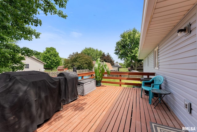 1409 10th Ave, Viola, IL 61486 - wooden deck with a grill