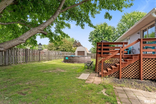 1409 10th Ave, Viola, IL 61486 - view of yard featuring a wooden deck and stairway