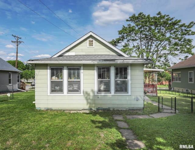 1036 30th St, Rock Island, IL 61201 - rear view of house featuring roof with shingles