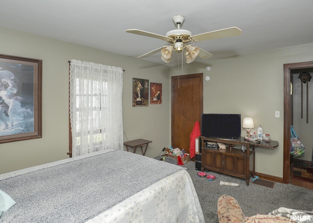 1036 30th St, Rock Island, IL 61201 - carpeted bedroom featuring ceiling fan