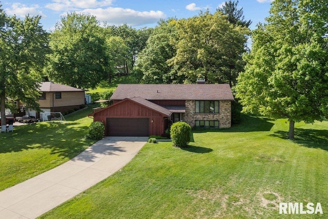 440 Center Dr, Geneseo, IL 61254 - view of front facade featuring a garage, concrete driveway, board and batten siding, a front lawn, and stone siding