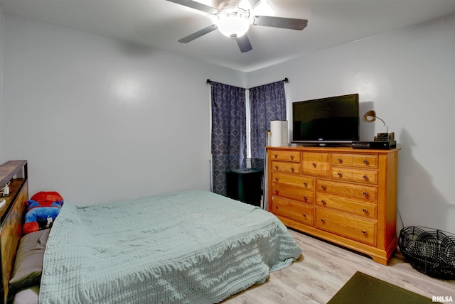2303 Dunham St, Clinton, IA 52732 - bedroom featuring wood finished floors and ceiling fan