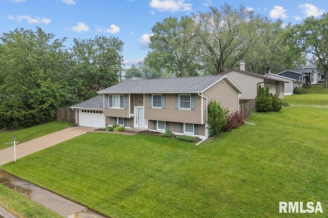 237 Colony Dr, Davenport, IA 52806 - split foyer home with a garage and concrete driveway