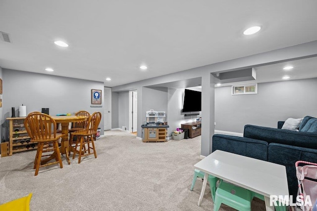 237 Colony Dr, Davenport, IA 52806 - dining space with recessed lighting and light colored carpet