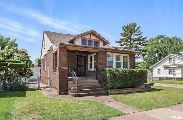 3602 18th Ave, Rock Island, IL 61201 - view of front of property featuring a front yard and brick siding