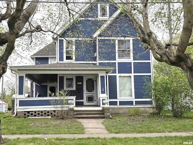 301 W Main St, Morrison, IL 61270 - view of front facade with a porch and roof with shingles