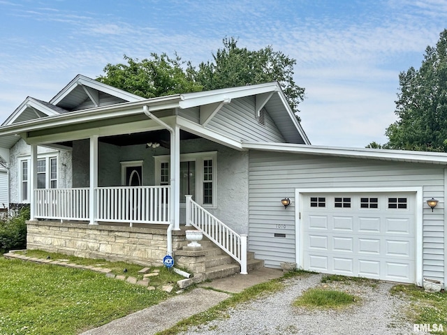 1010 W White St, Marion, IL 62959 - single story home featuring an attached garage, driveway, covered porch, and stucco siding