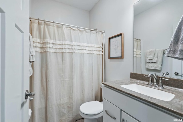 4241 Colorado Dr, Bettendorf, IA 52722 - bathroom with toilet, vanity, and a shower with curtain