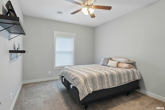 4241 Colorado Dr, Bettendorf, IA 52722 - bedroom with carpet, baseboards, and a ceiling fan