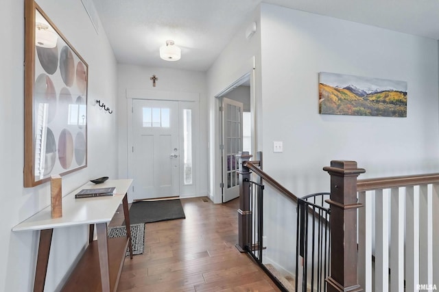 4241 Colorado Dr, Bettendorf, IA 52722 - entrance foyer featuring wood-type flooring and baseboards