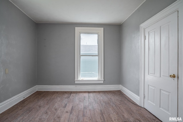 1415 Pershing Ave, Davenport, IA 52803 - spare room with plenty of natural light, wood finished floors, and baseboards