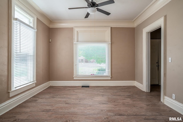 1415 Pershing Ave, Davenport, IA 52803 - unfurnished room featuring ornamental molding, ceiling fan, wood finished floors, and baseboards