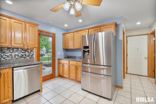 859 45th Ave, East Moline, IL 61244 - kitchen with stainless steel appliances, light tile patterned flooring, backsplash, a ceiling fan, and recessed lighting