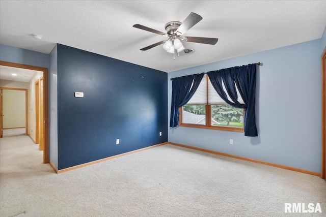 859 45th Ave, East Moline, IL 61244 - empty room with carpet flooring, baseboards, and a ceiling fan