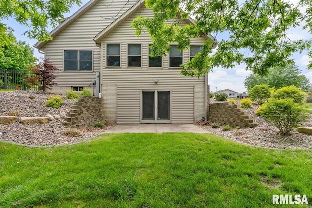 859 45th Ave, East Moline, IL 61244 - rear view of property with a patio area