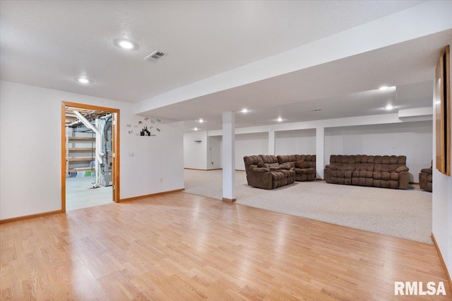 859 45th Ave, East Moline, IL 61244 - living room with recessed lighting, wood finished floors, and baseboards