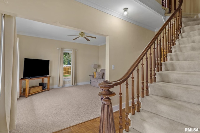 608 S Main St, Port Byron, IL 61275 - staircase featuring crown molding, a ceiling fan, and carpet floors