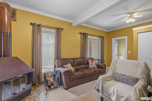 608 S Main St, Port Byron, IL 61275 - living room featuring ceiling fan and ornamental molding