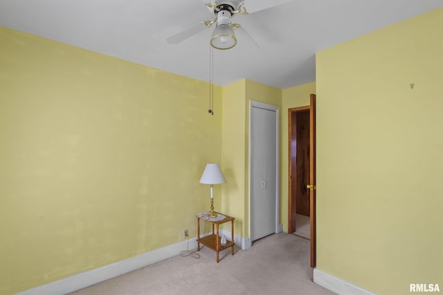 608 S Main St, Port Byron, IL 61275 - empty room with light colored carpet and ceiling fan