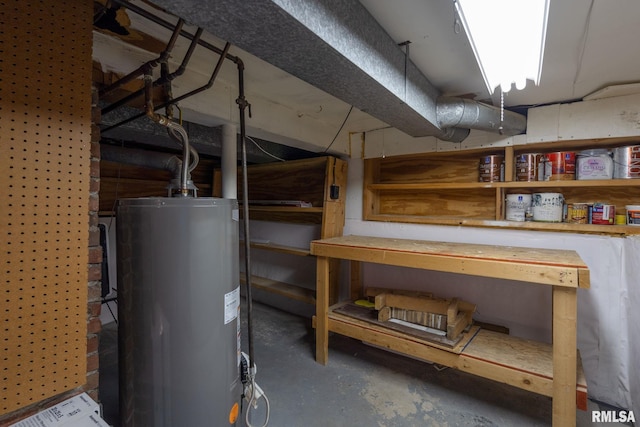 608 S Main St, Port Byron, IL 61275 - unfinished basement featuring gas water heater