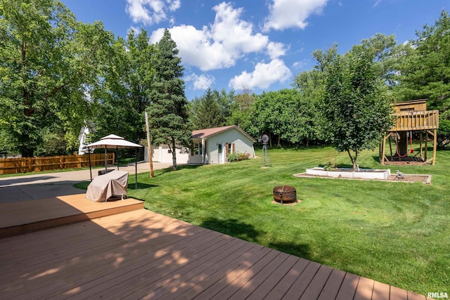 608 S Main St, Port Byron, IL 61275 - deck with an outdoor fire pit and view of scattered trees
