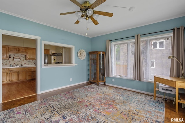 608 S Main St, Port Byron, IL 61275 - spare room featuring a ceiling fan and crown molding