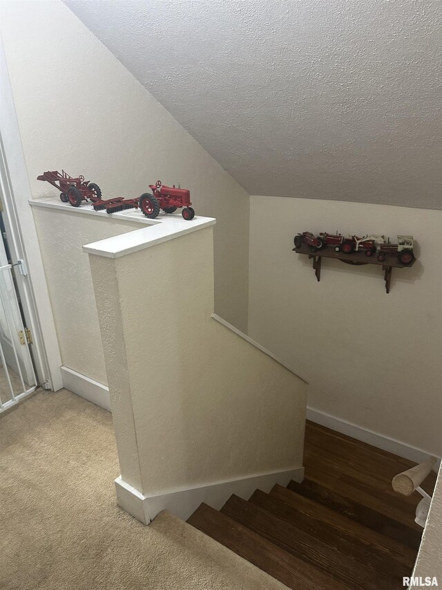 119 S Elm St, Williamsfield, IL 61489 - stairway with a textured ceiling, baseboards, and vaulted ceiling